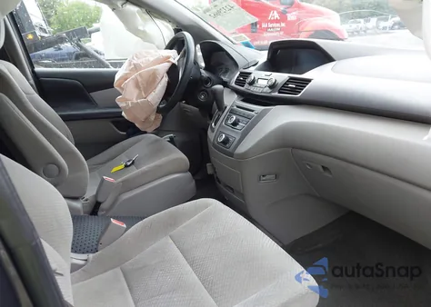 2014 Honda Odyssey Lx z USA, uszkodzony, nr VIN 5FNRL5H24EB129725